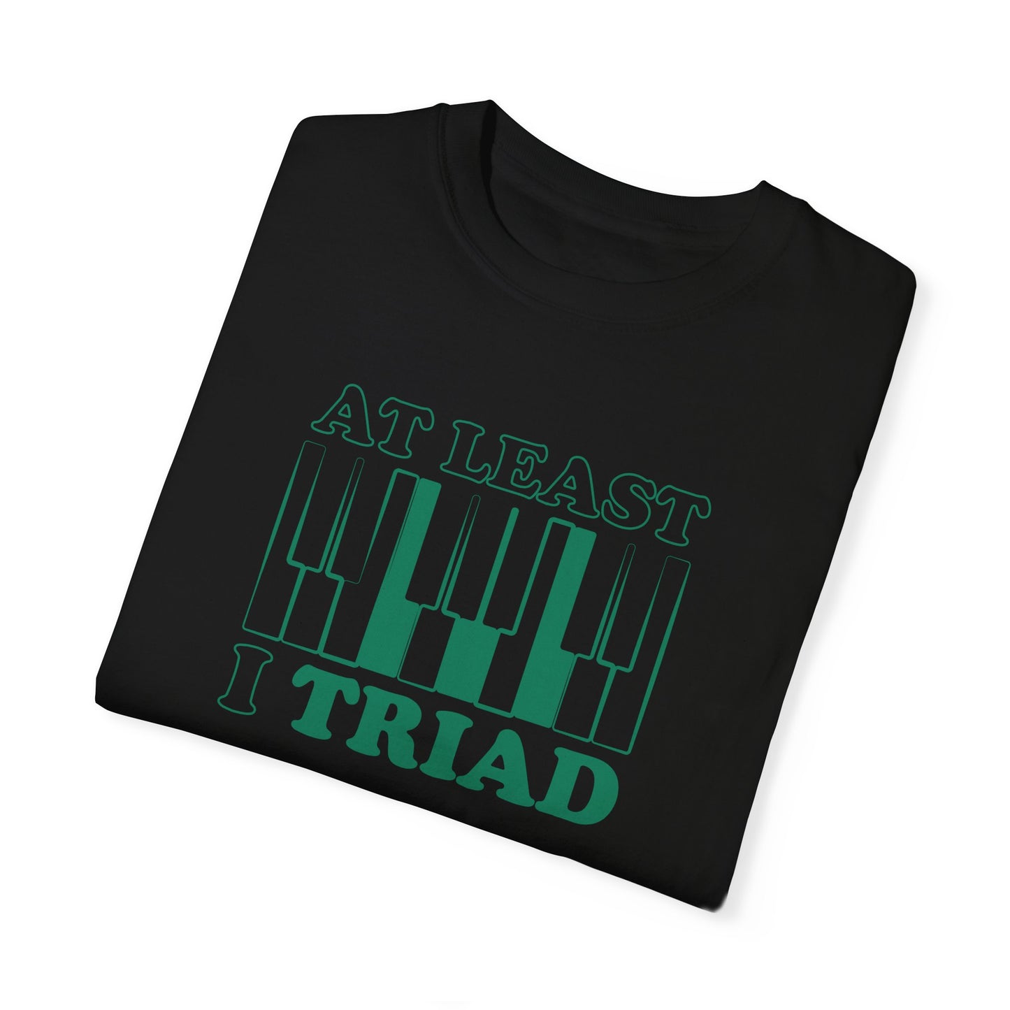 Tee Shirt with Piano Keys, an F major chord is highlighted.  Above read the words "At least I Triad".  Black Shirt.